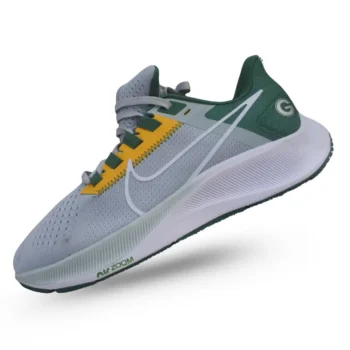 Tenis deportivos para hombre en gris y verde con amortiguación.